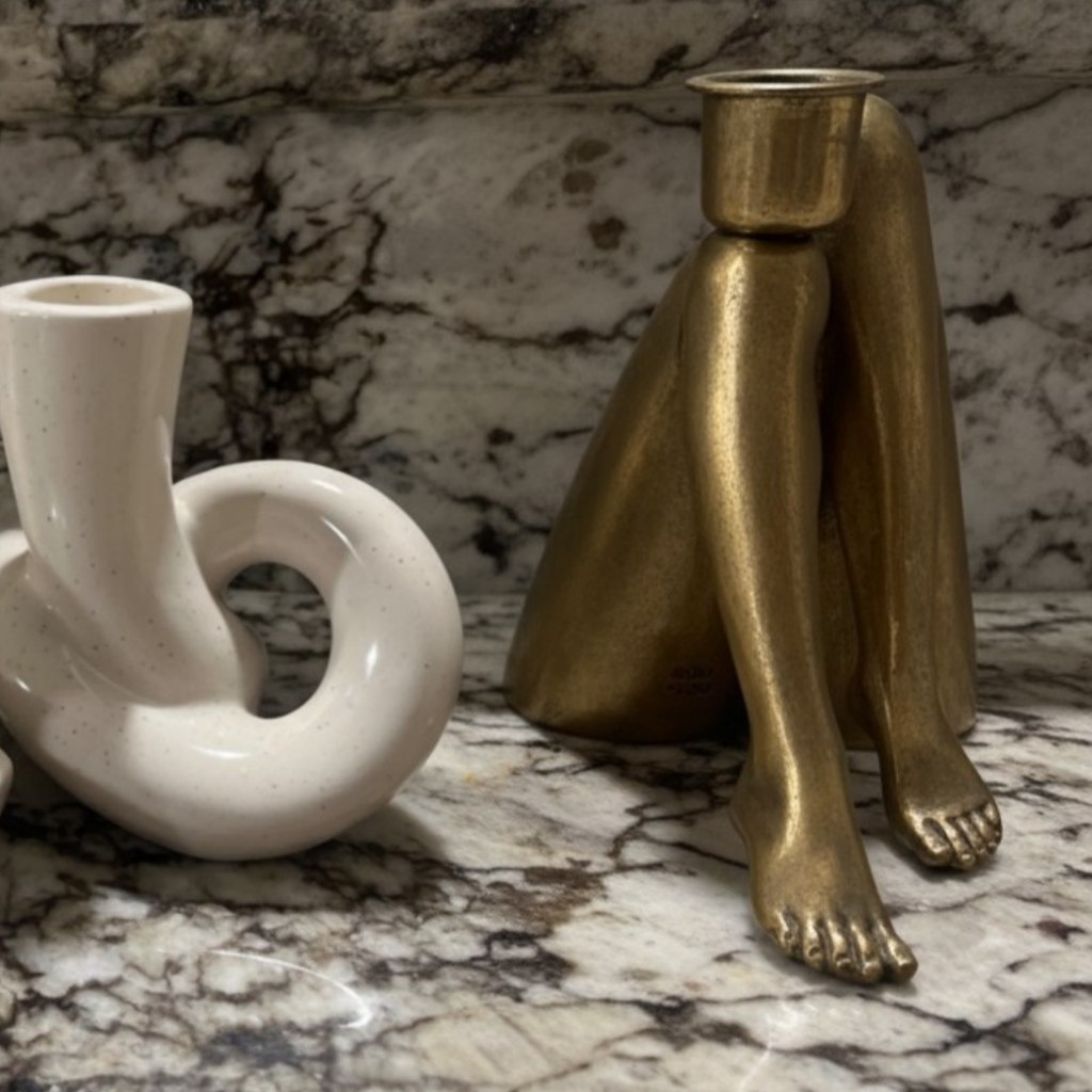 Gold candle holder marble scene