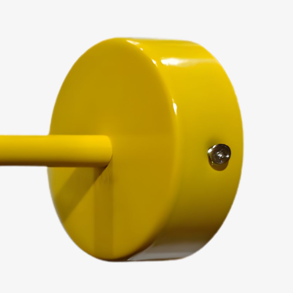Yellow wall light wall plate detail
