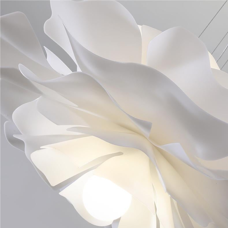 Side detail of sculptural lotus flower pendant light