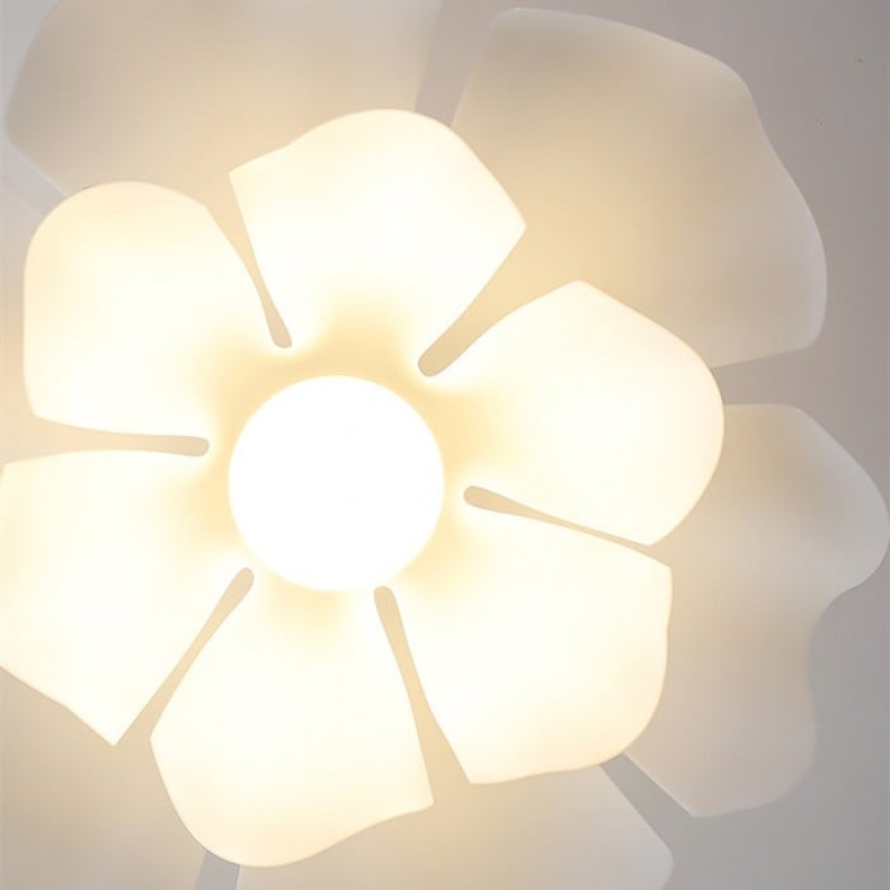 Close-up of illuminated flower pendant light