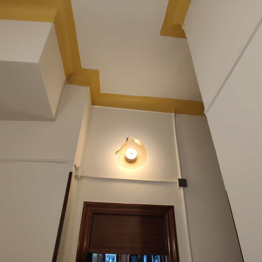 Real customer hallway photo of the Lunacrest wall light