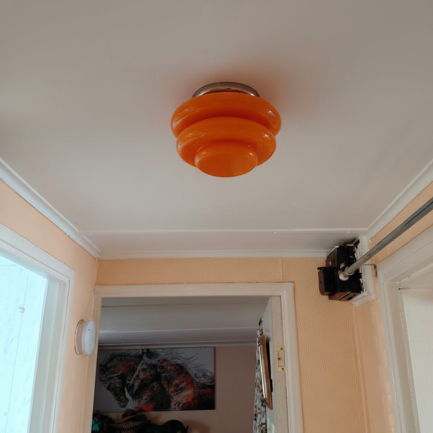 Real customer photo of orange Cirren ceiling light