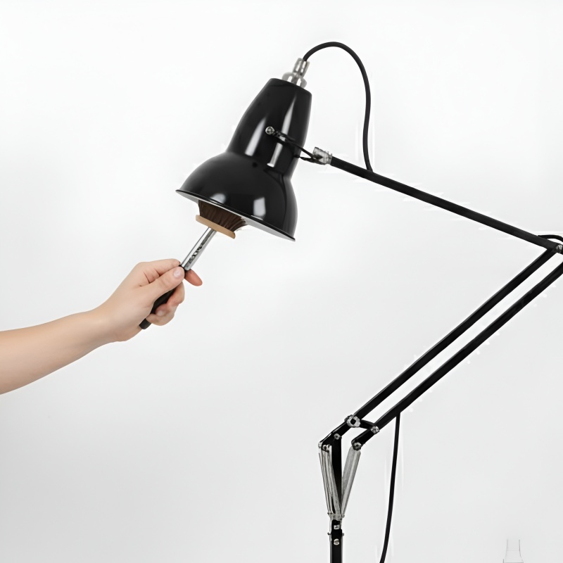 Cleaning lamp gaps with small brush