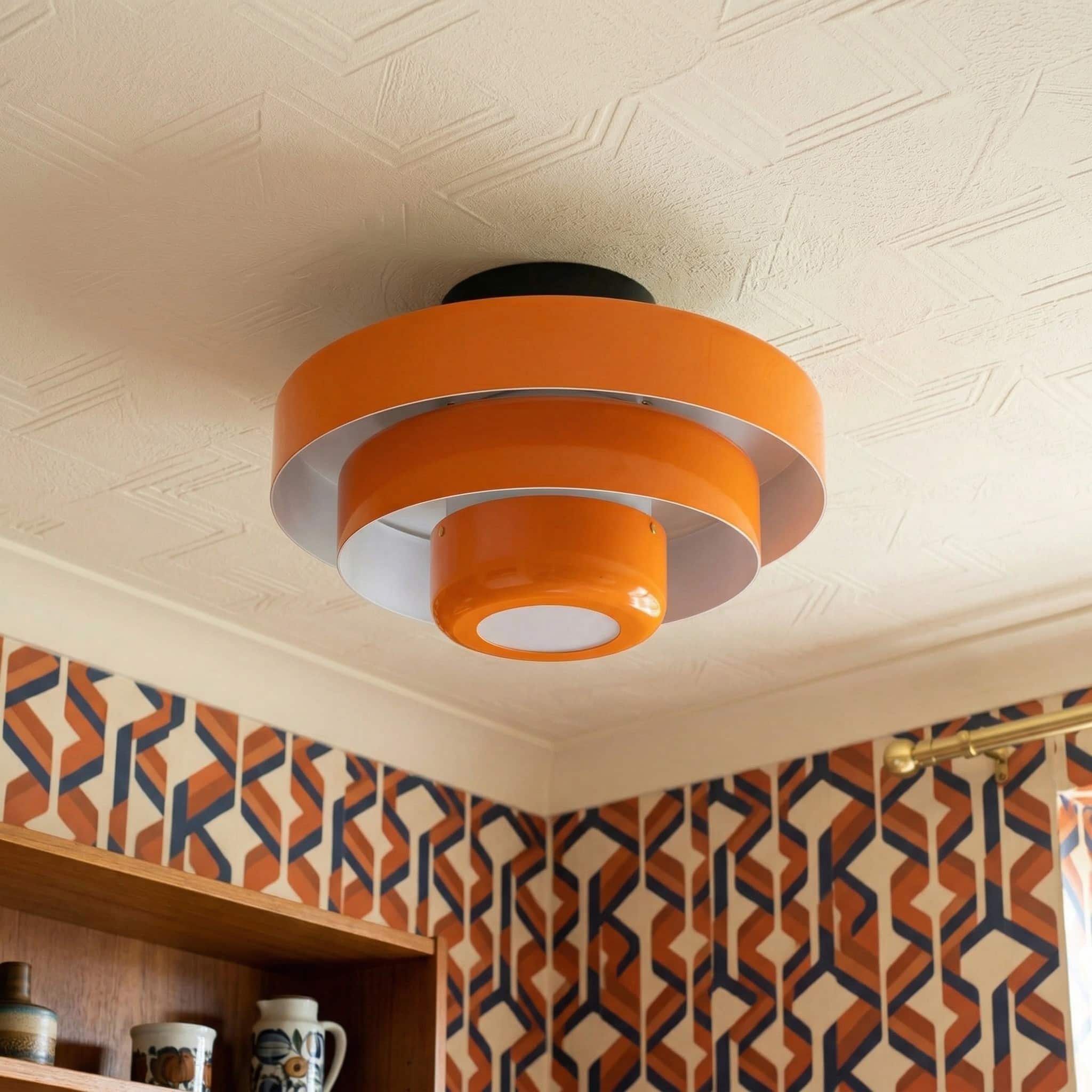 Red Veleora Bauhaus ceiling lamp in a room