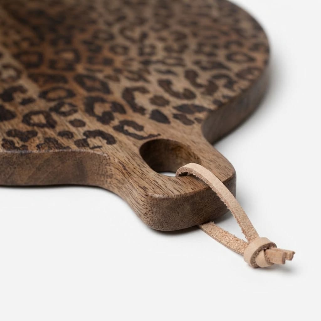 Rounded edge and handle detail of leopard print board