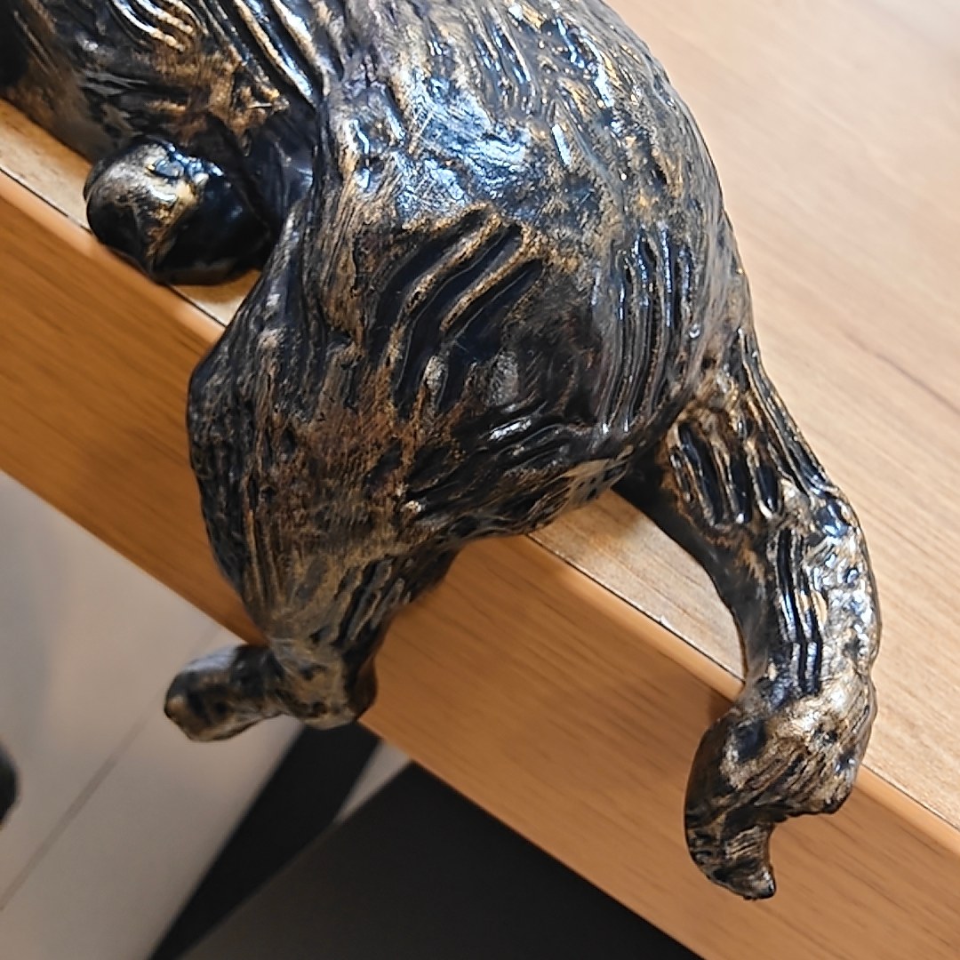 Close-up of the Floxo Lazy Dog Sculpture tail and rear detail