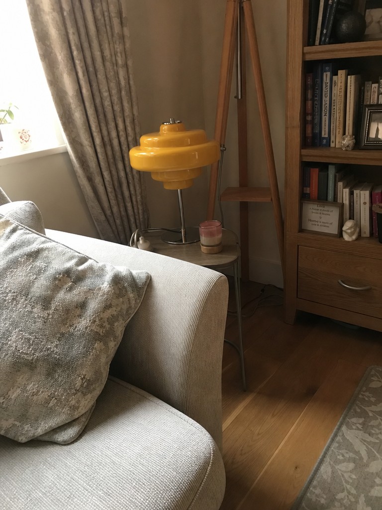 Customer room photo featuring a yellow Koloro table lamp