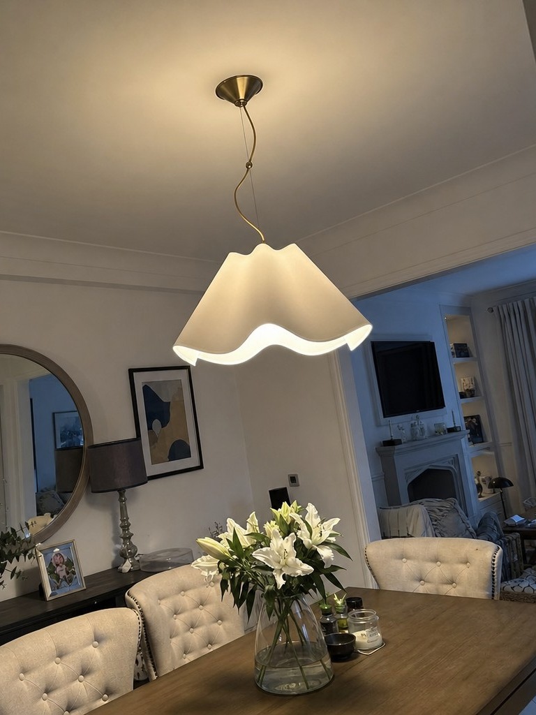Customer dining room with Oslan pendant lit