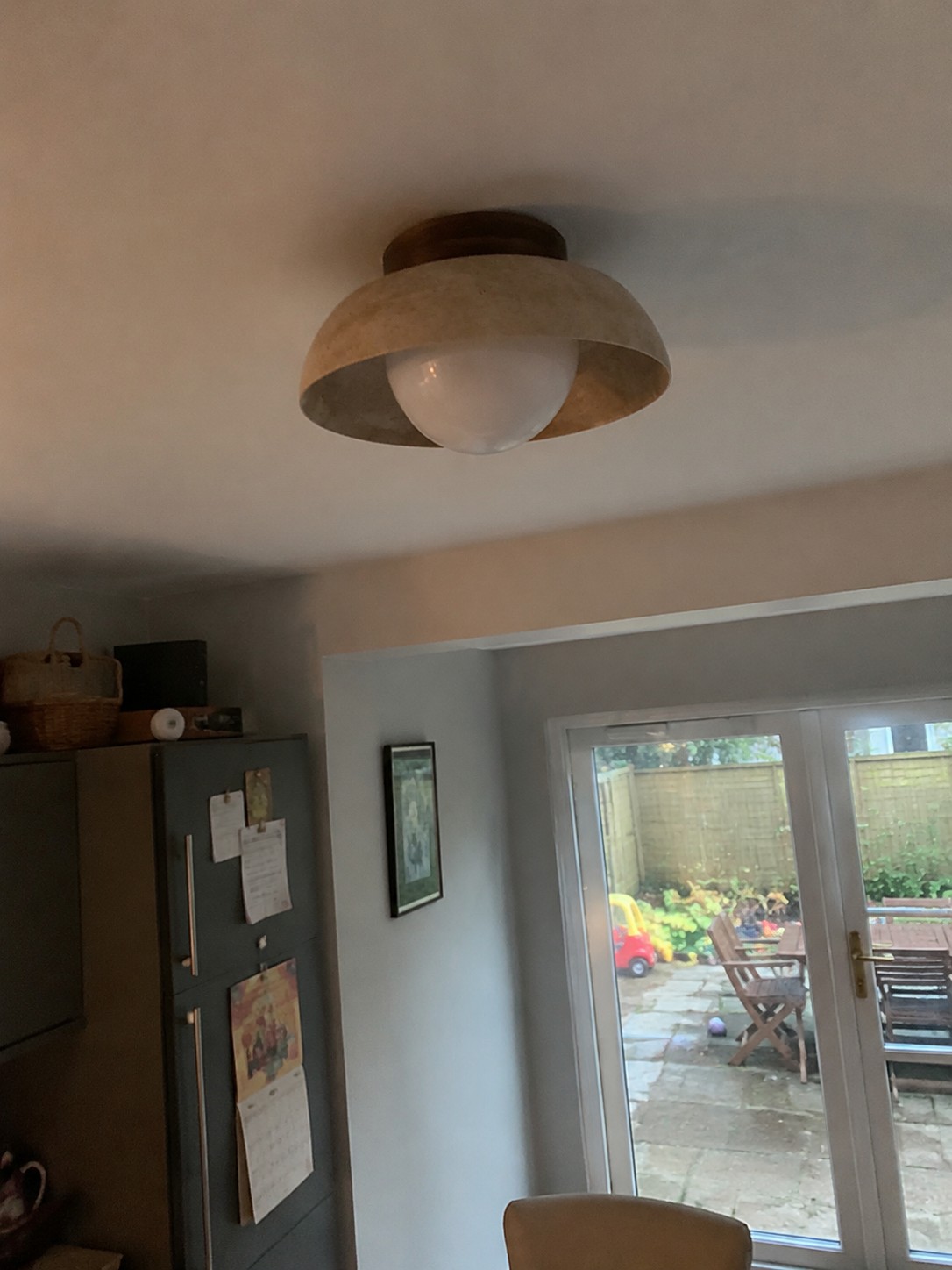 Customer installation photo of travertine ceiling light