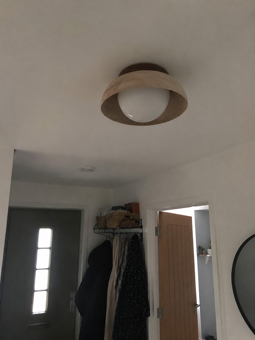 Customer hallway photo with travertine ceiling light