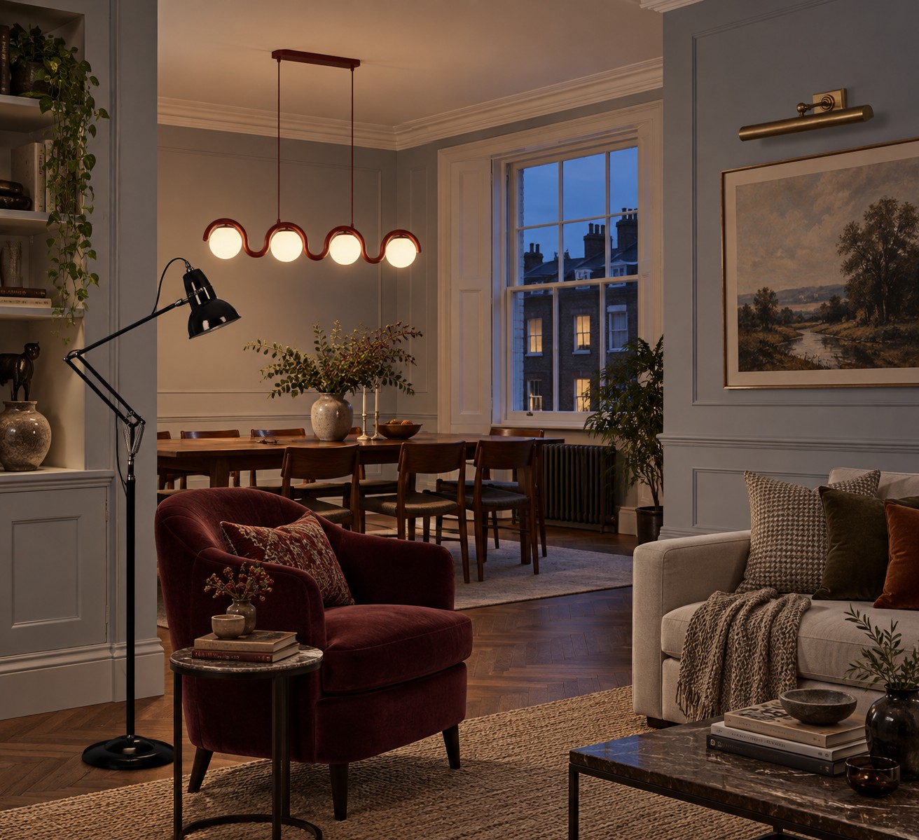 Een zitkamer met een evenwichtige, sfeervolle verlichting over de hele ruimte.