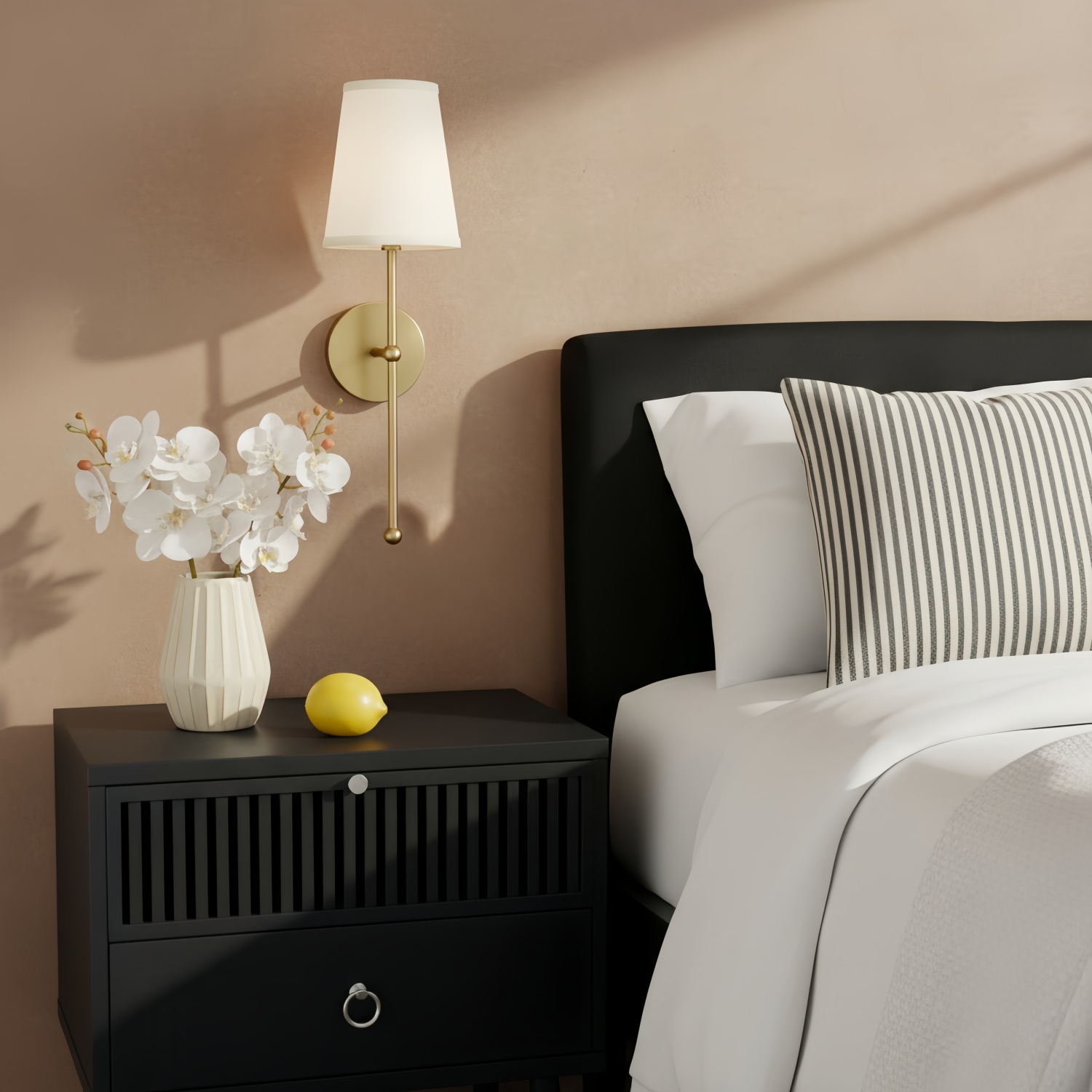 Meshara wall lamp beside a bed