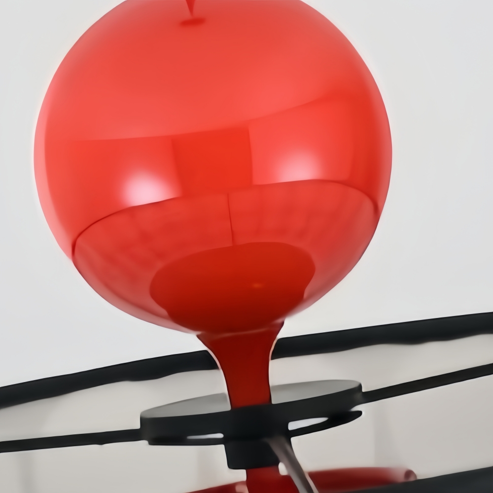 Close-up of Dotrelia red pendant detail