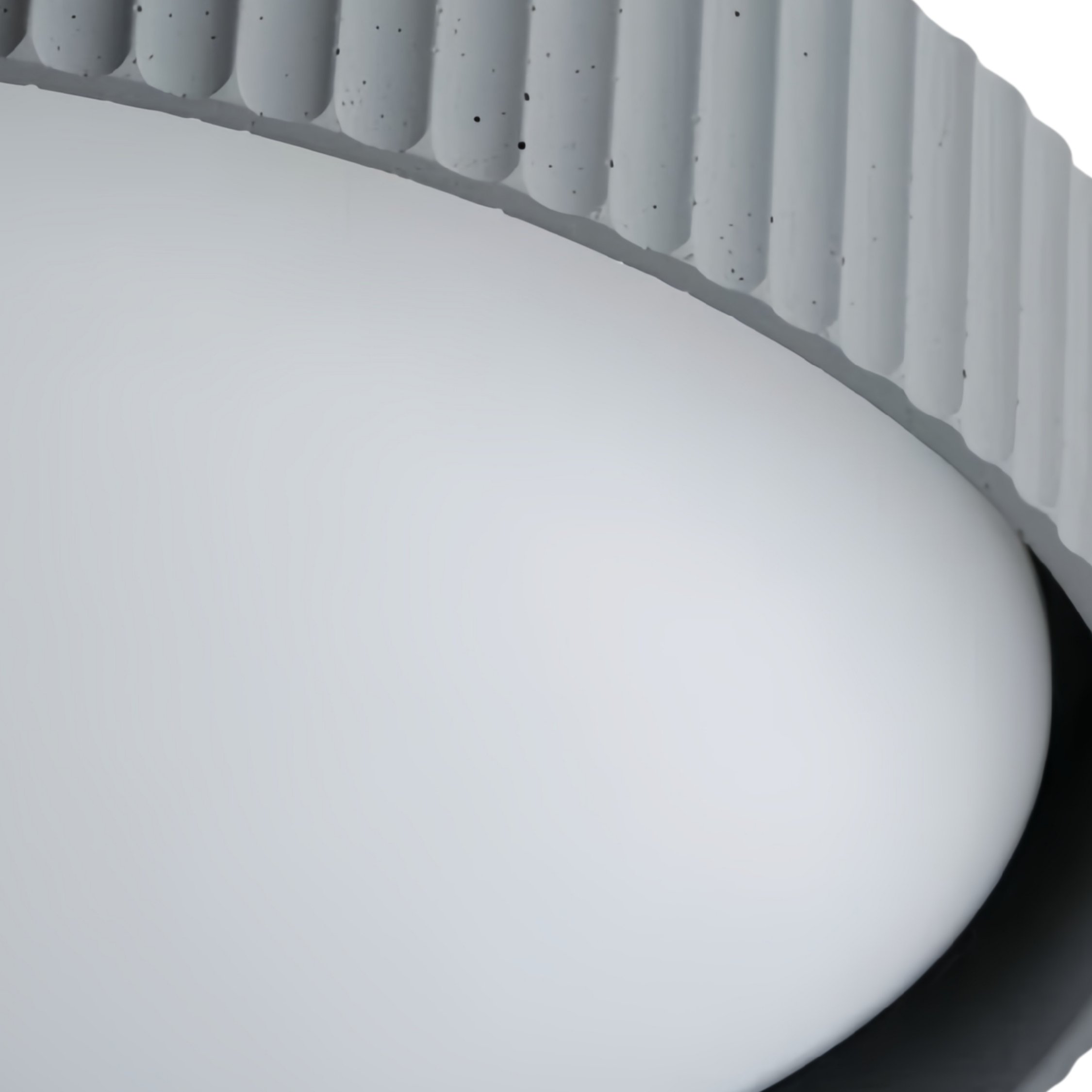 Close-up of the Acrion white finish and acrylic diffuser