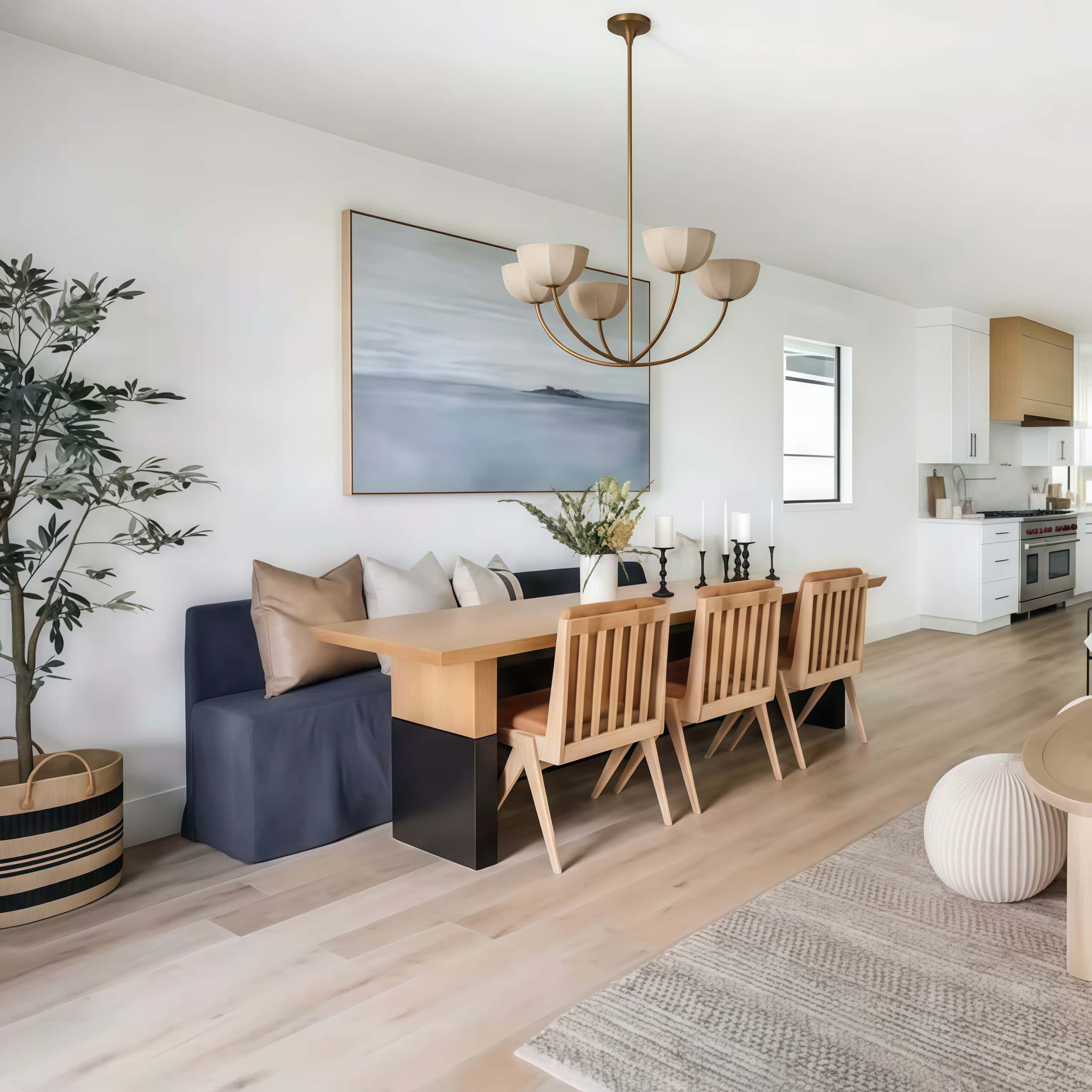 Customer room with Loomis chandelier over a dining table