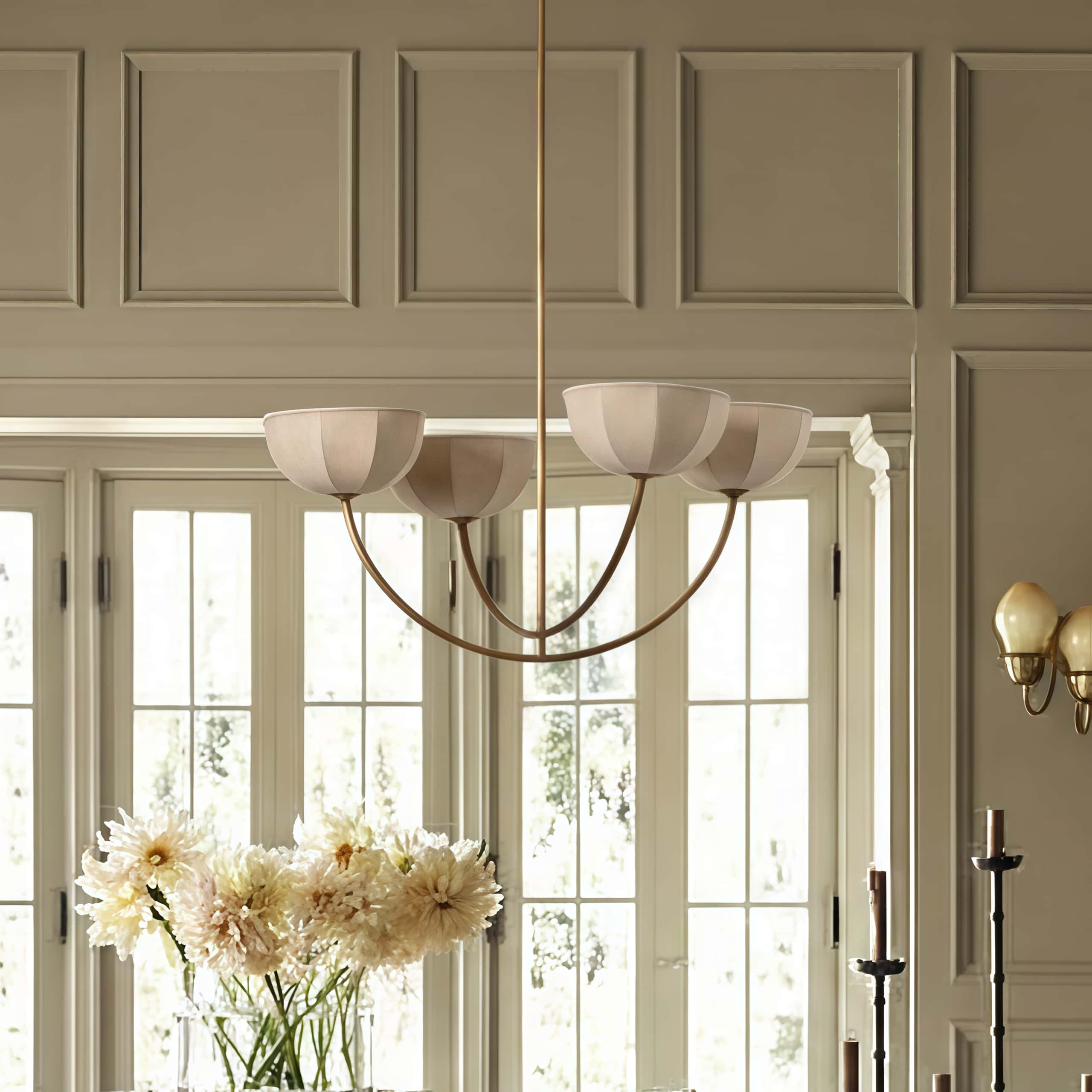 Customer room with Loomis chandelier and floral table display