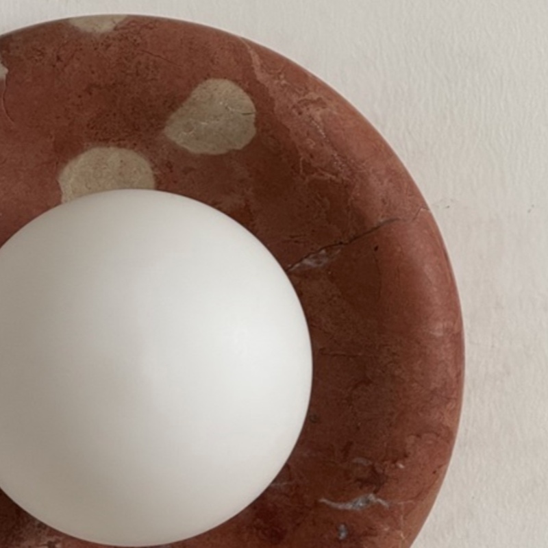 Close-up of Oria red stone finish