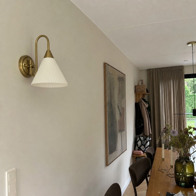 Customer photo of the wall lamp on a hallway wall