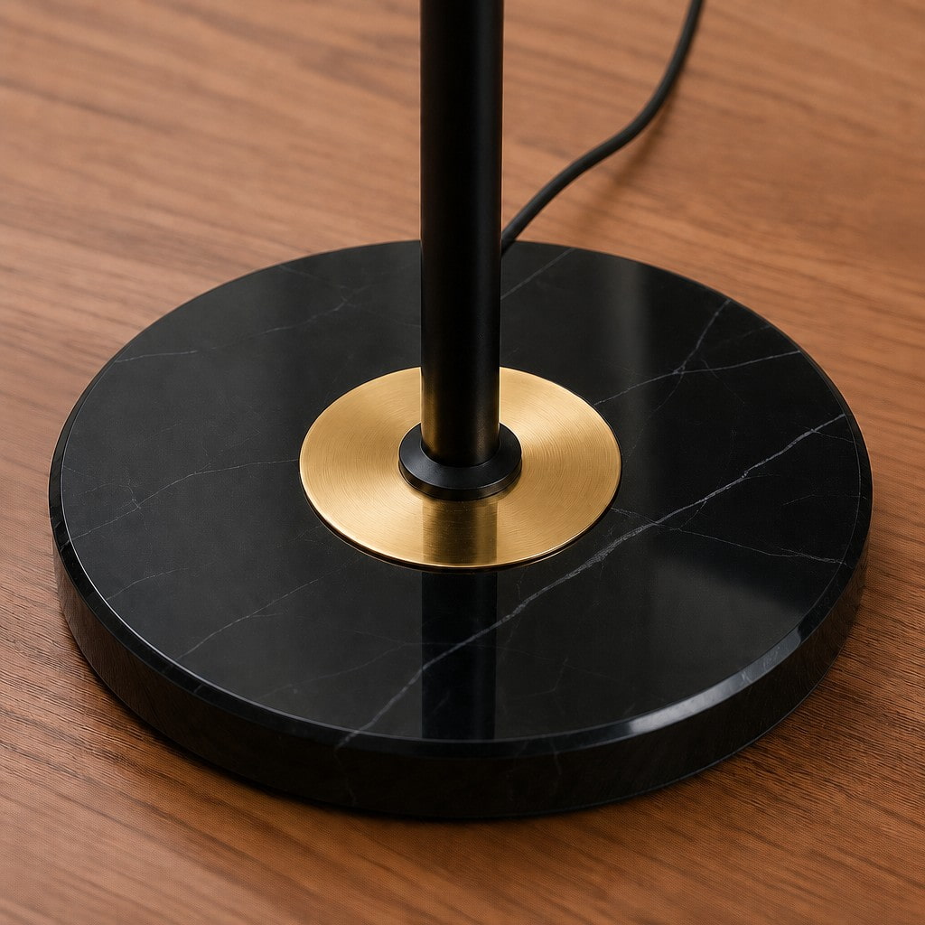 Close view of black marble base and pole