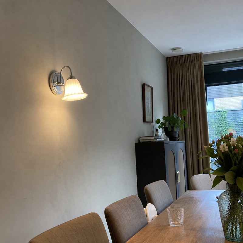 Customer dining room photo with wall lamp