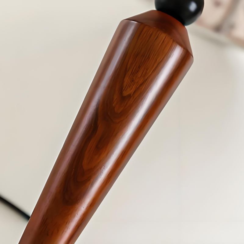 Close-up of the wooden lamp stem