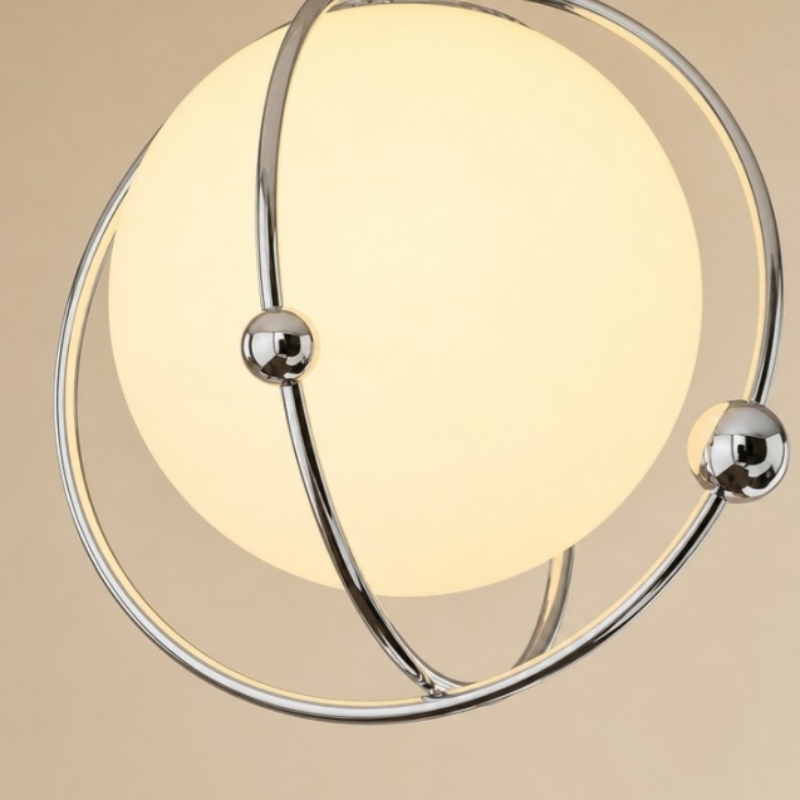 Close-up of the illuminated glass globe shade