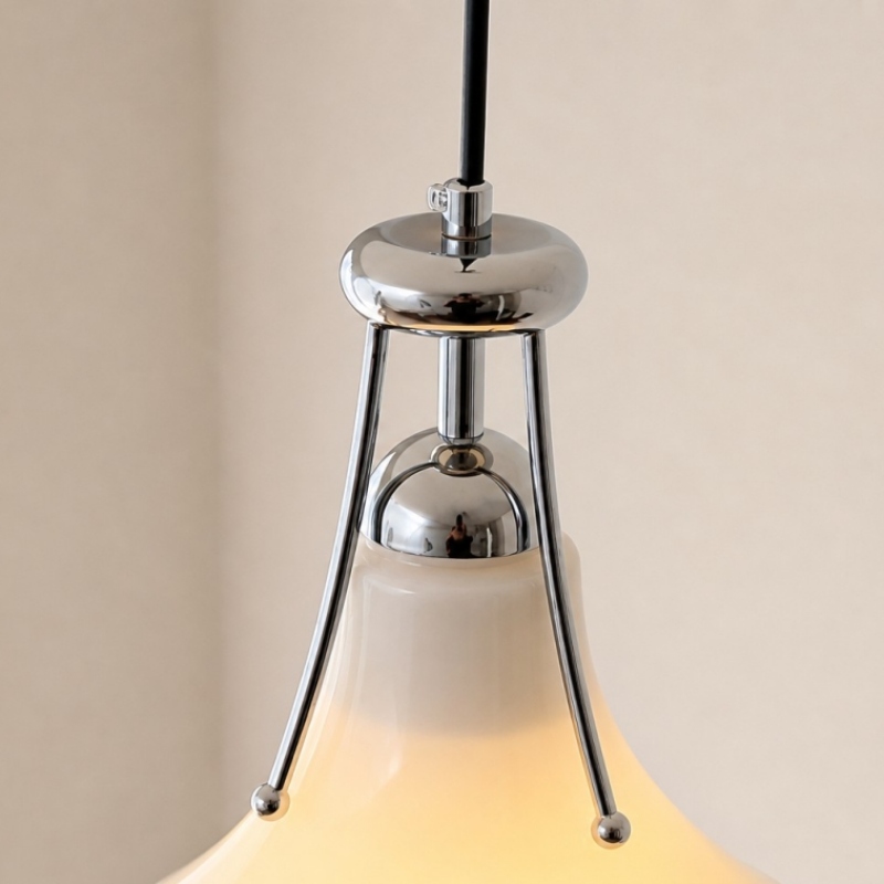 Chrome cap and frame detail of the pendant lamp