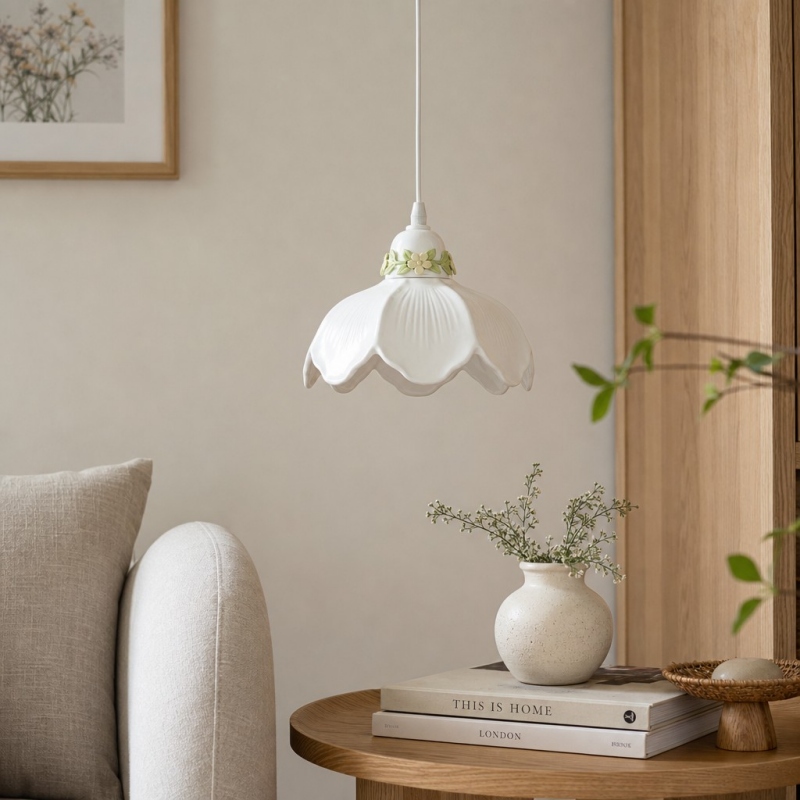 White flower pendant lamp in a calm living corner