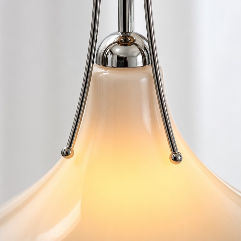 Close-up of the glowing magnolia glass shade