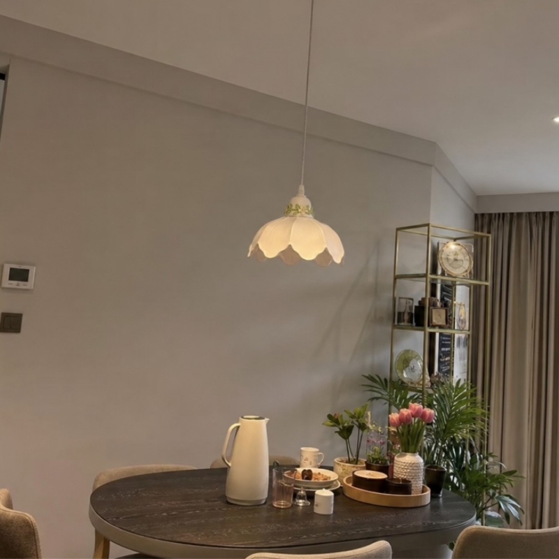 Customer room photo showing the warm glow of the pendant lamp