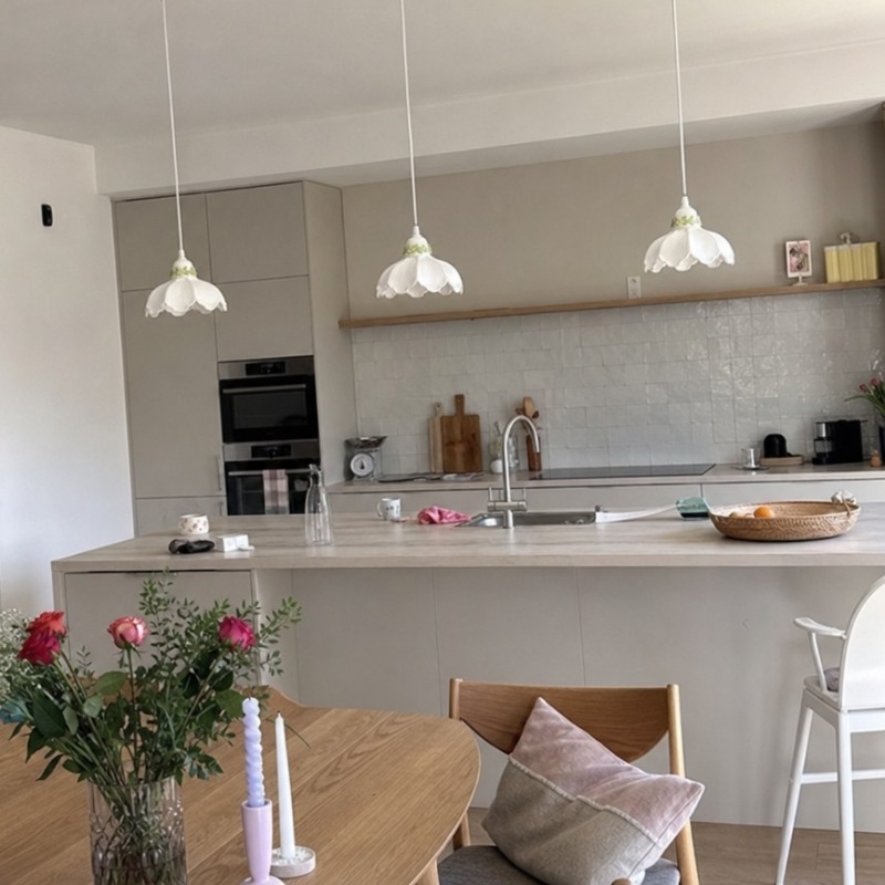 Customer kitchen and dining room photo with multiple pendant lamps