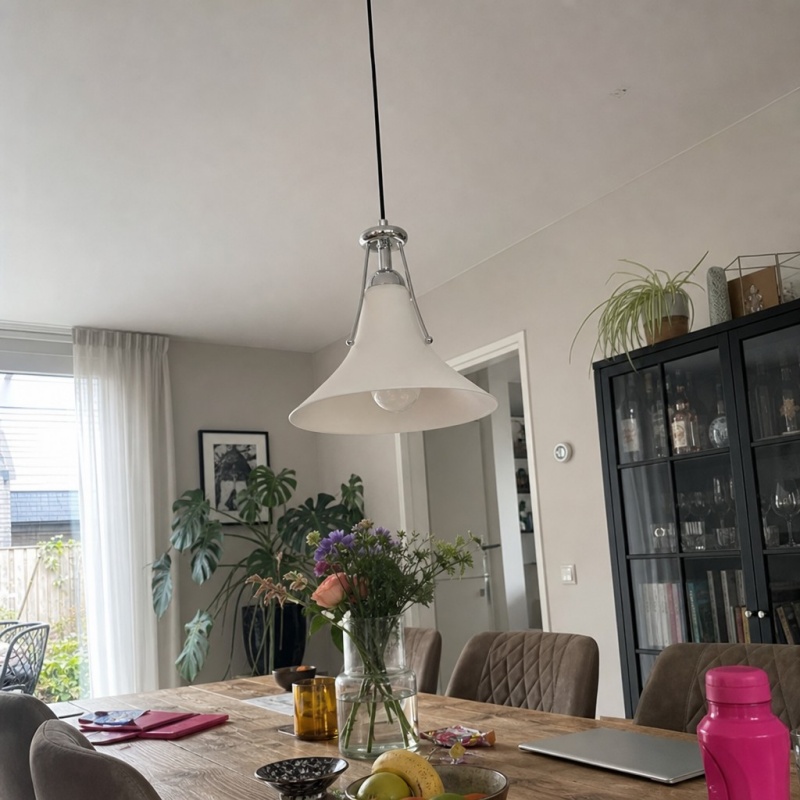 Customer installation photo of a Kallera pendant above a dining table