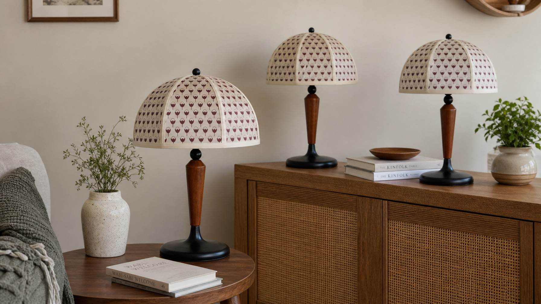 Three Fennary table lamps styled together on wooden furniture