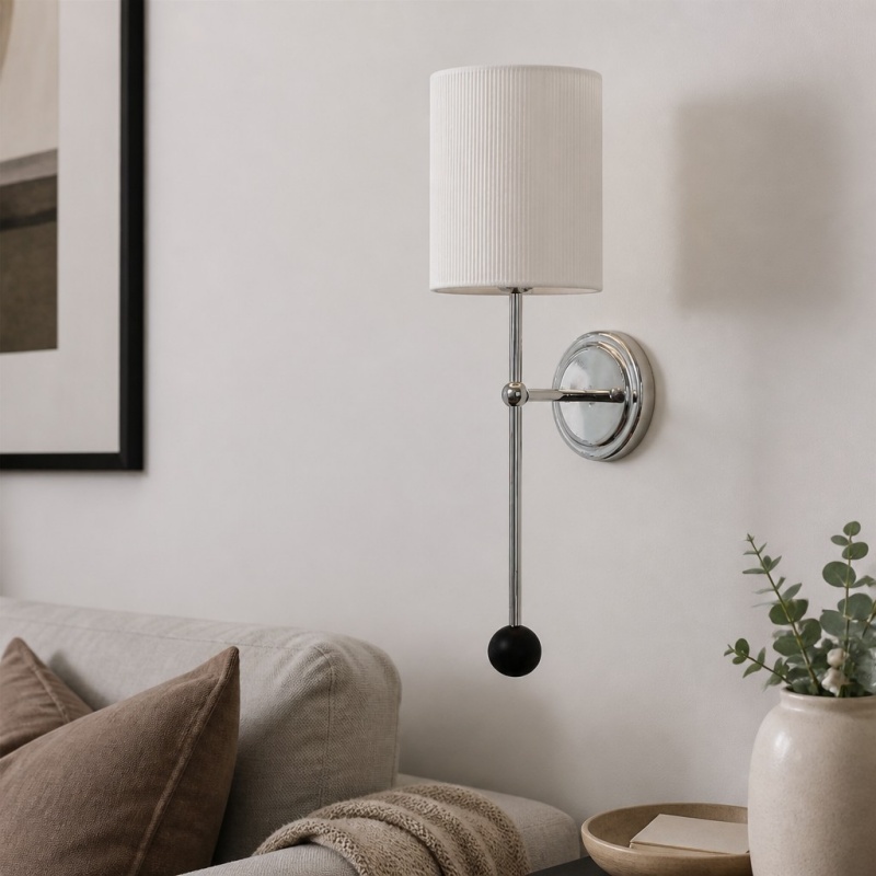 Cumoris wall lamp mounted above a seating nook