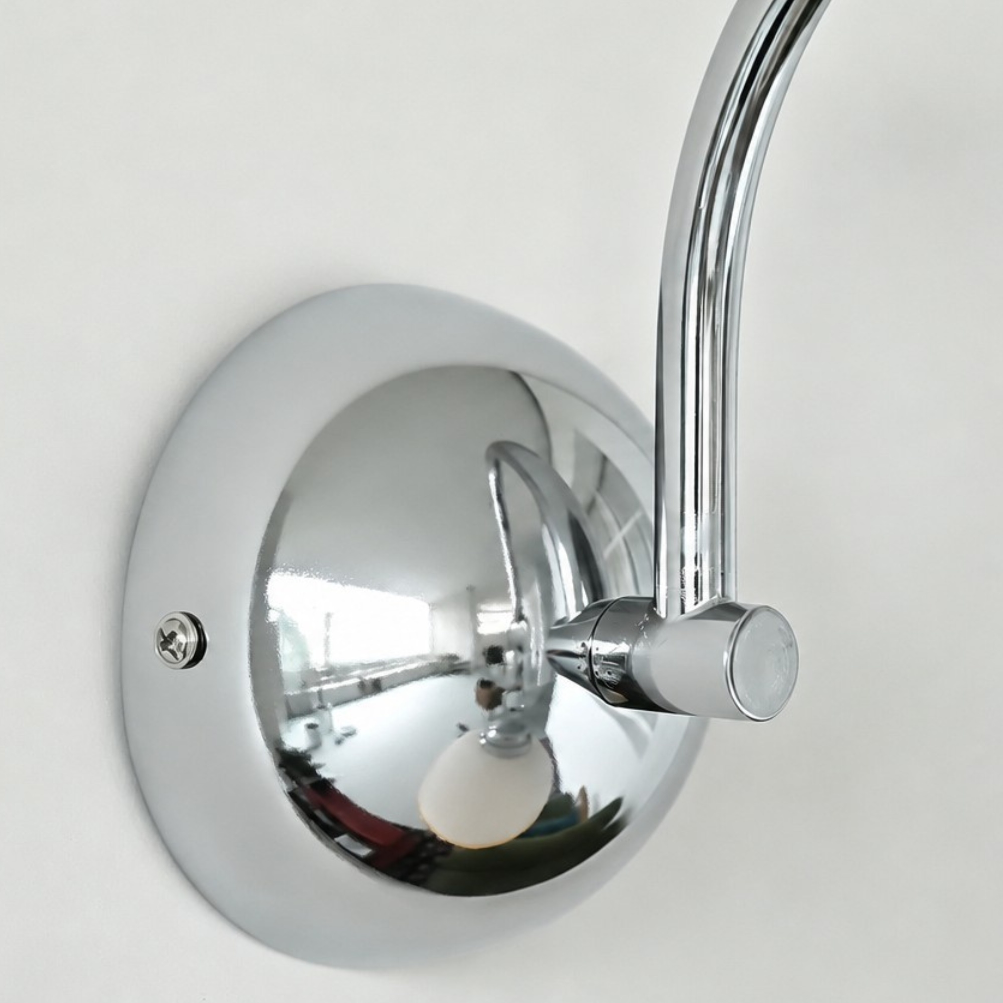 Chrome wall mount detail of the Afterglow Sunset wall lamp