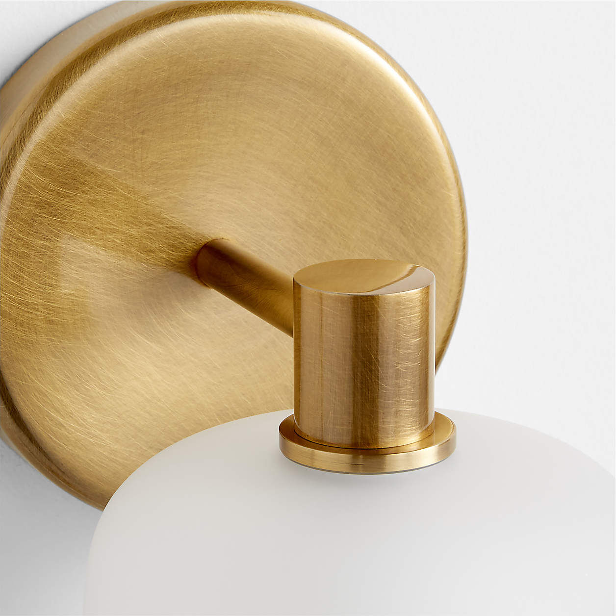 Burnished brass detail on the Lirra wall sconce