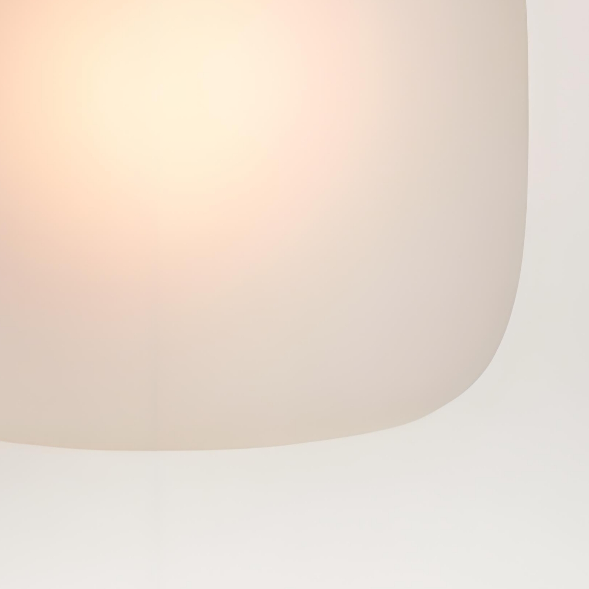 Frosted glass shade detail on the Lirra wall sconce