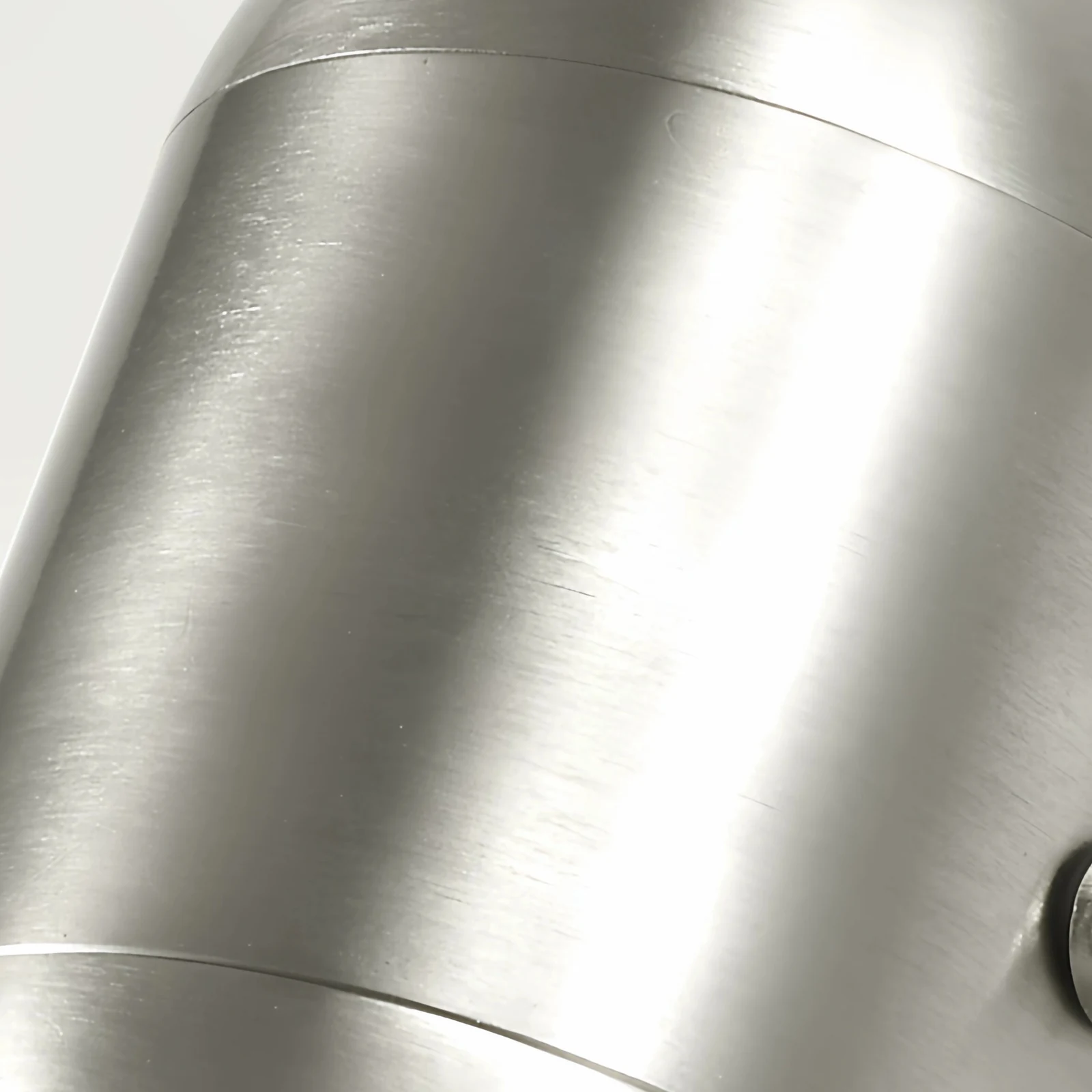 Brushed sand-nickel silver texture detail