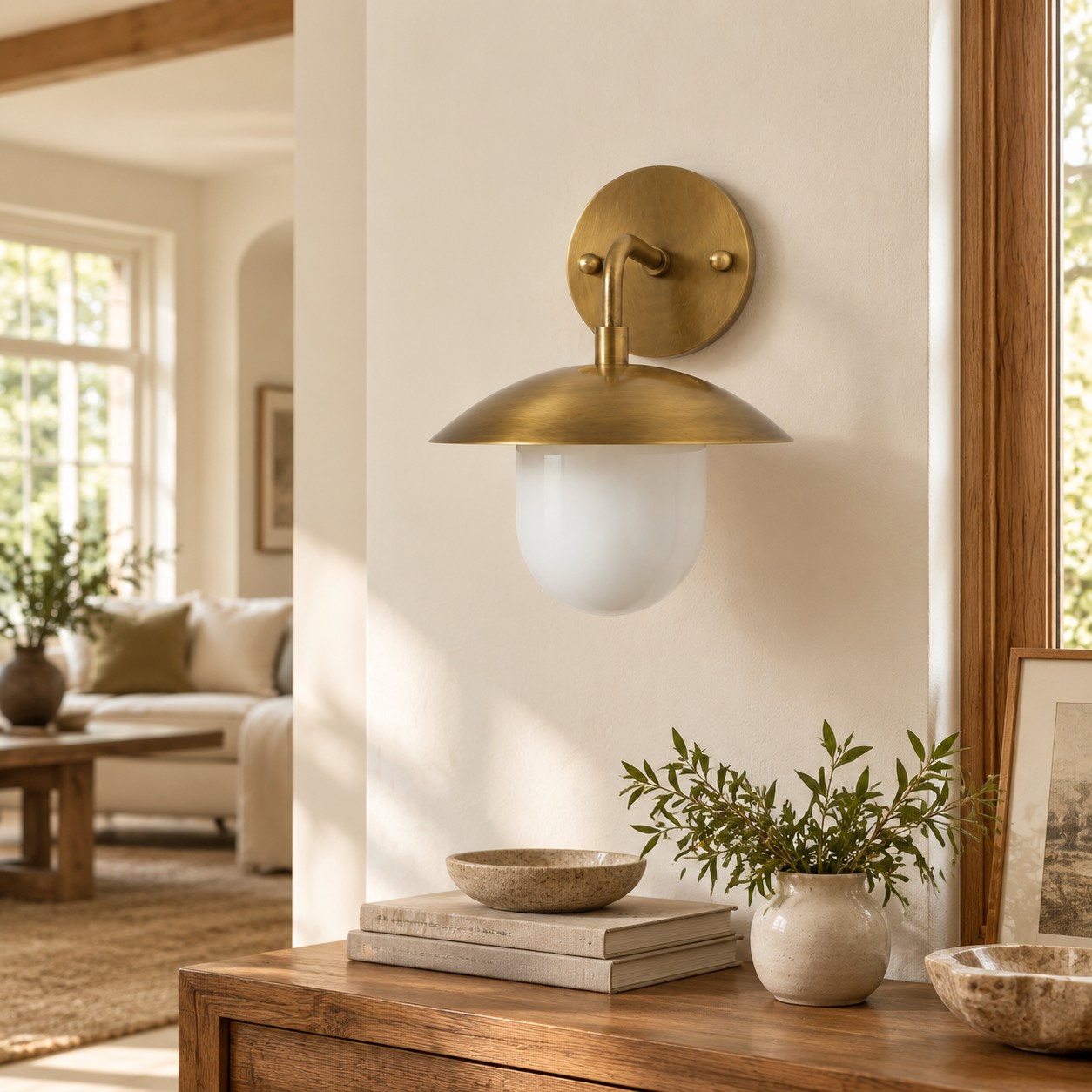 Frosted White Glass Globe — Brass-Finish Wall Sconce — A natural perspective