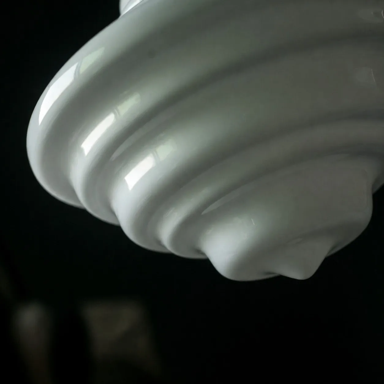 Glossy layered glass pendant detail