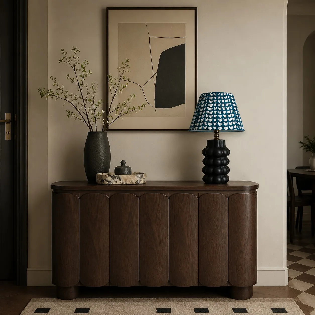 Sculptural ceramic table lamp styled on an entryway console