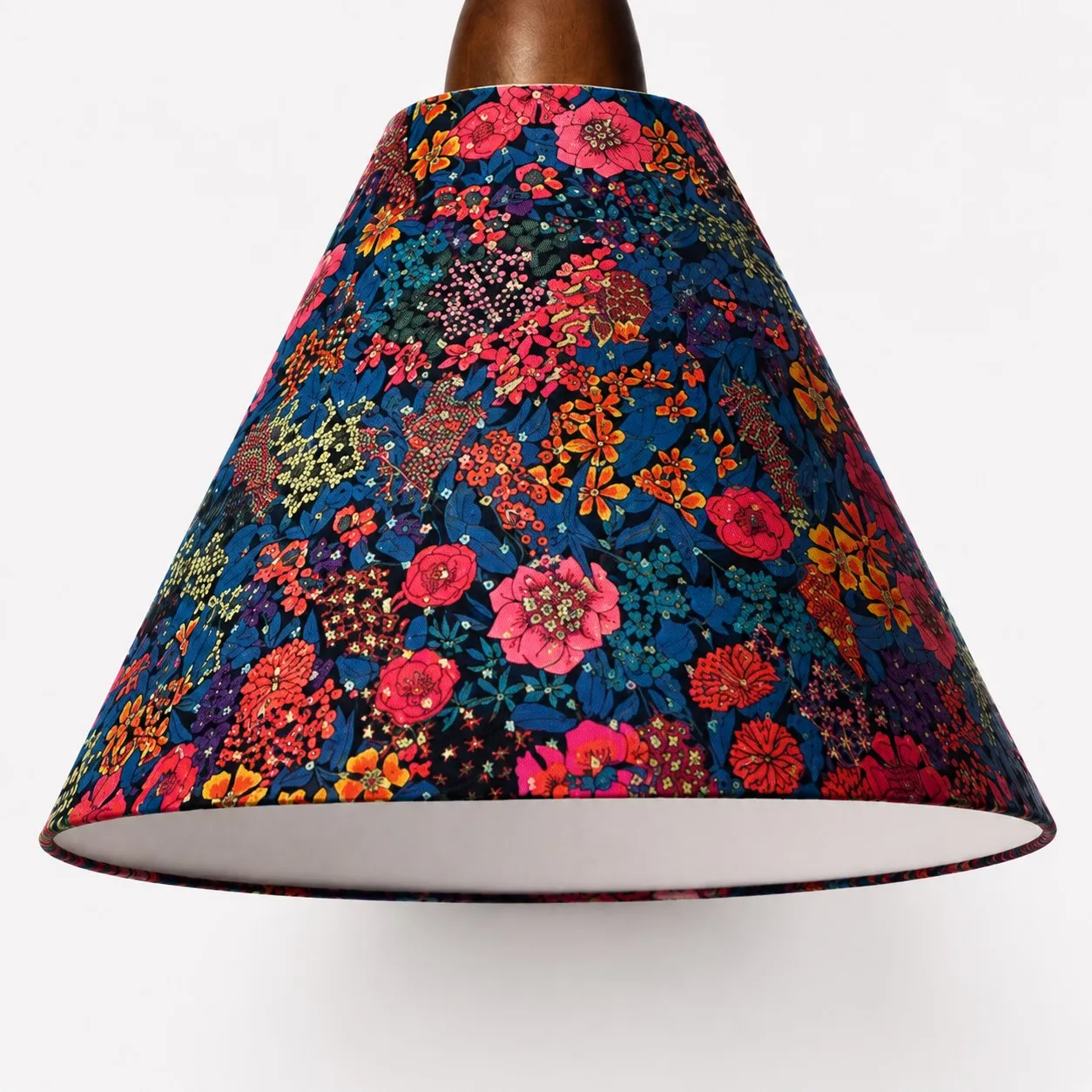 Close-up of dense botanical Liberty fabric texture and finished shade edge