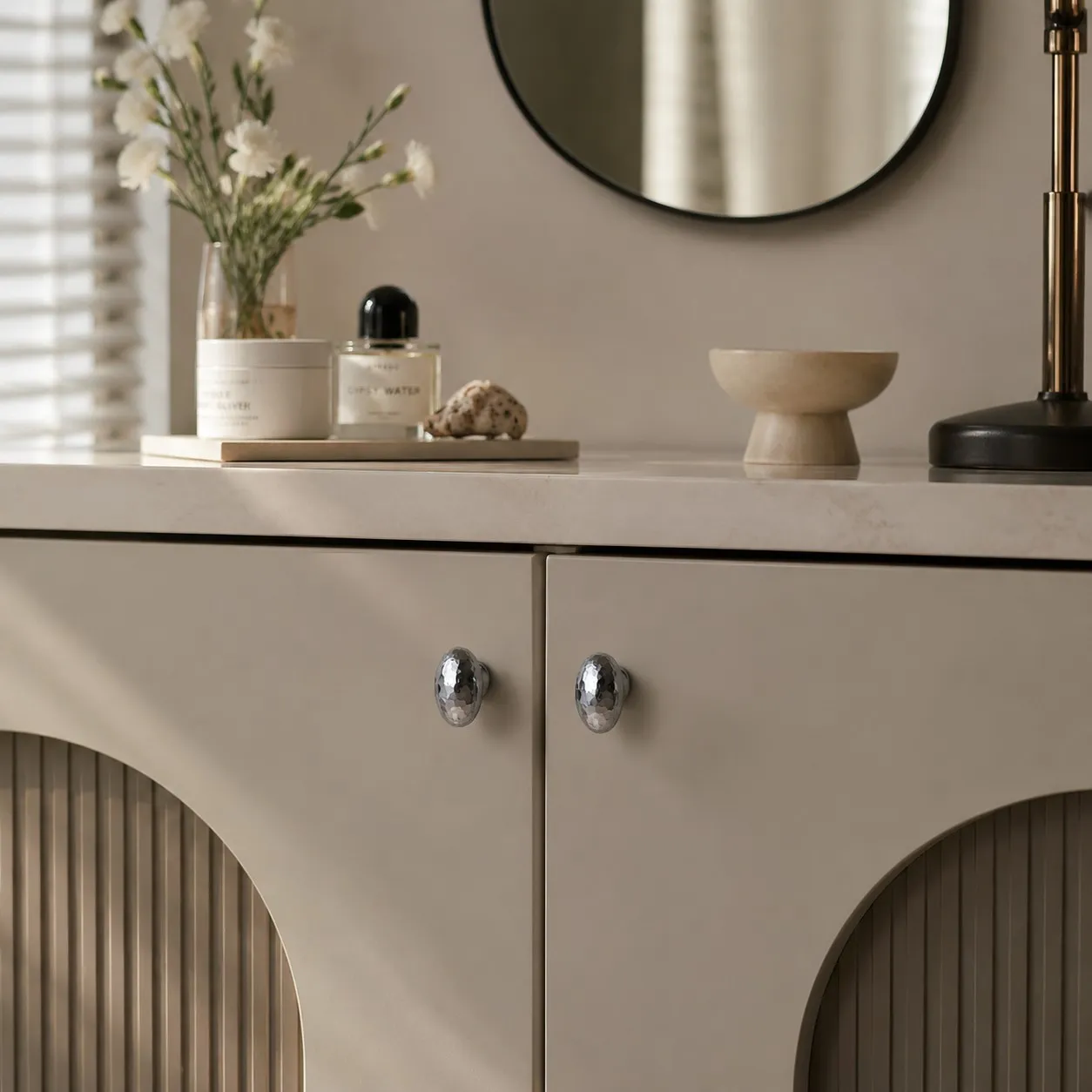 Decorative oval cabinet knob in use