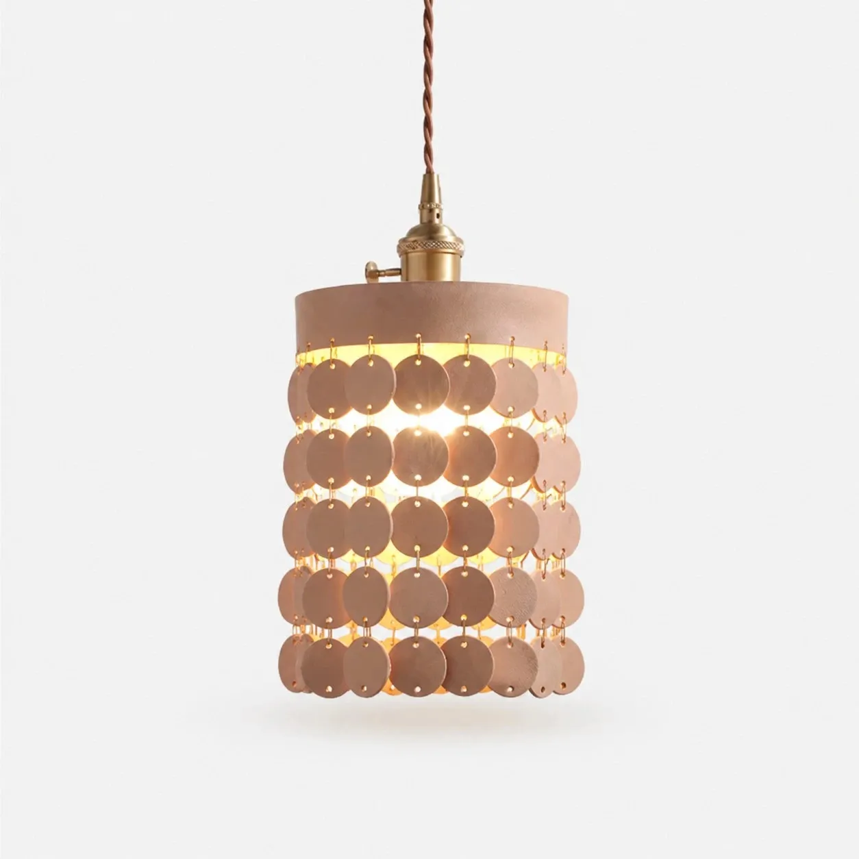 Natural leather pendant light on a white background