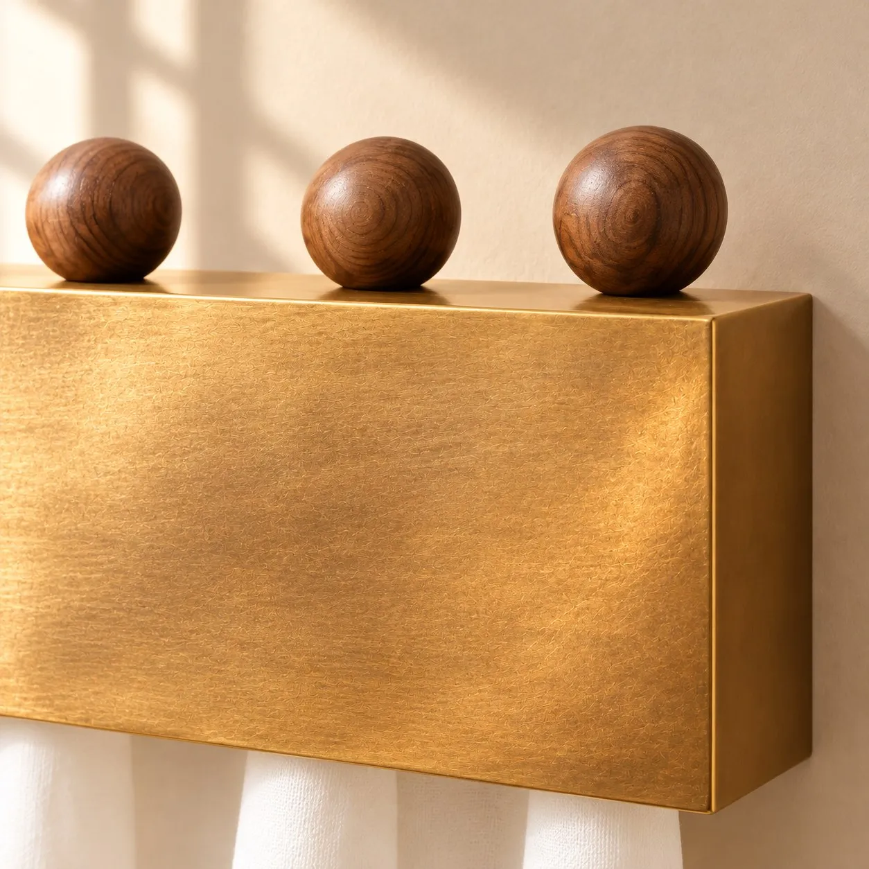 Natural brass housing and wooden spheres detail