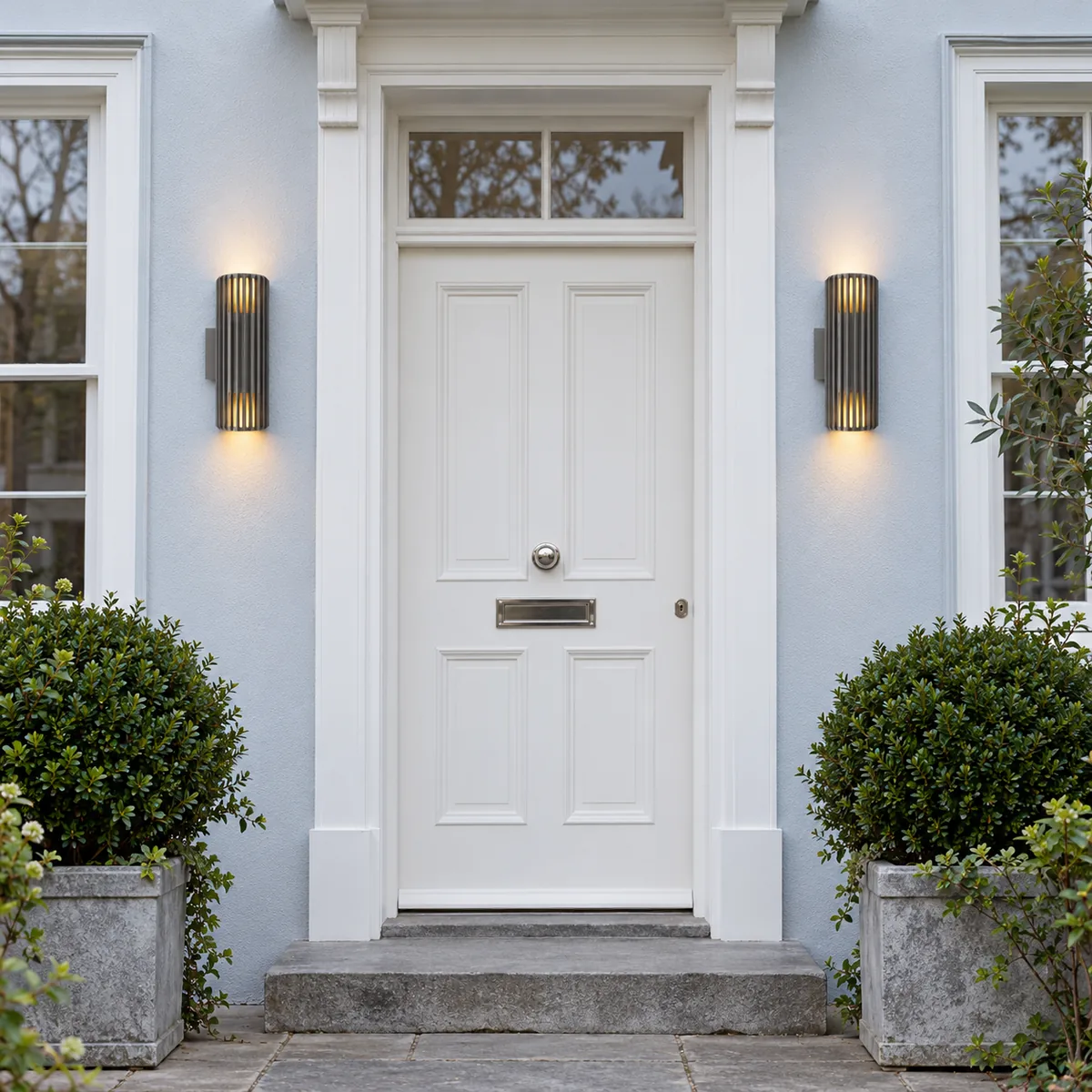 A Quiet Outdoor Sconce with an Open Base