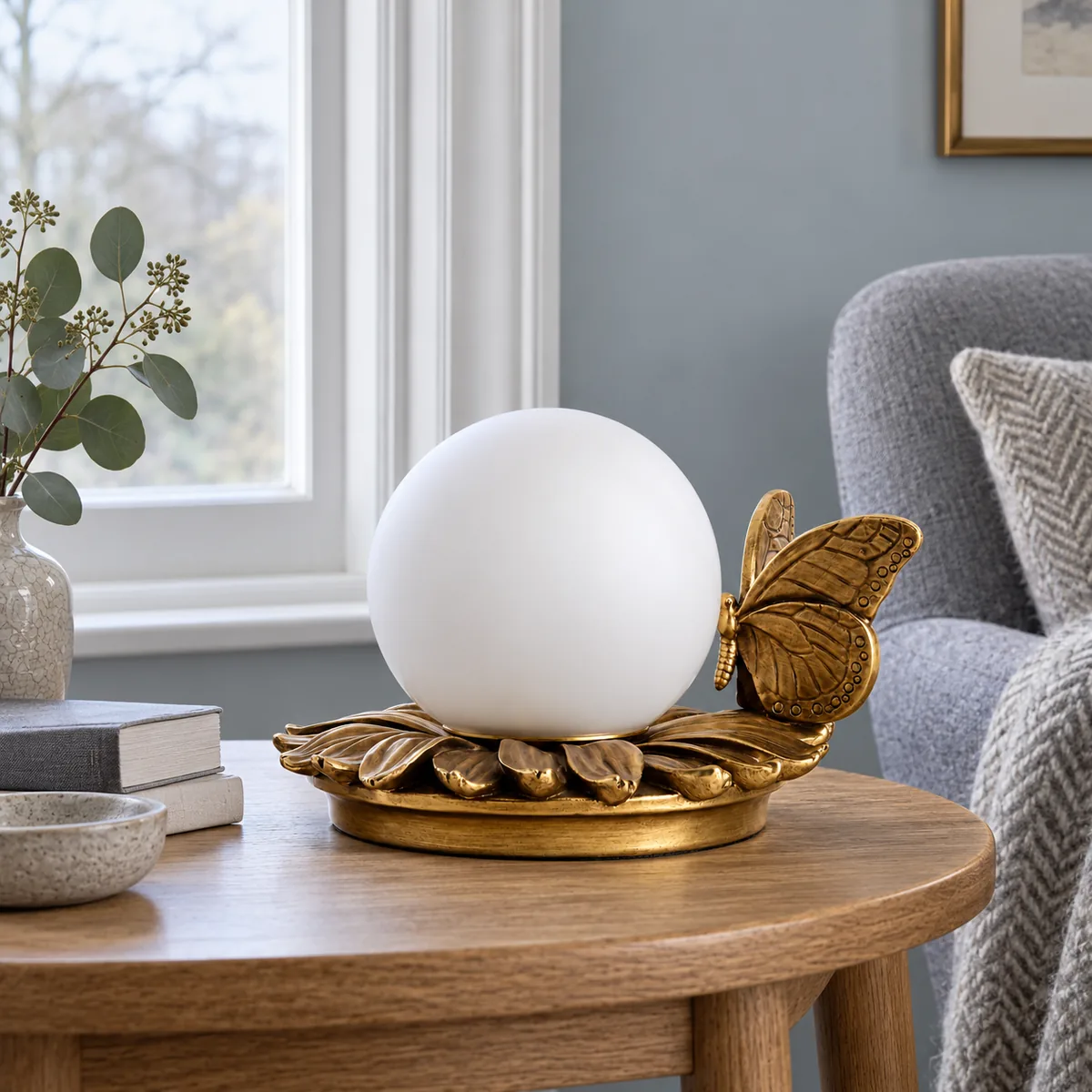 A Quiet Table Lamp with a Cast Butterfly