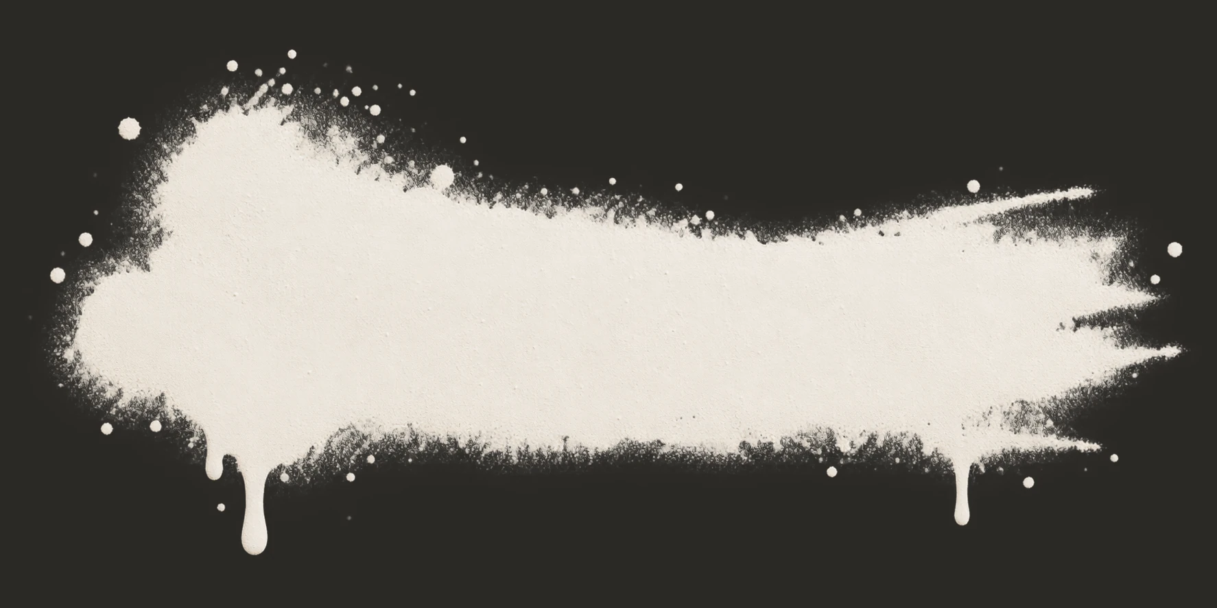 Matte ivory paint smear on a dark ground
